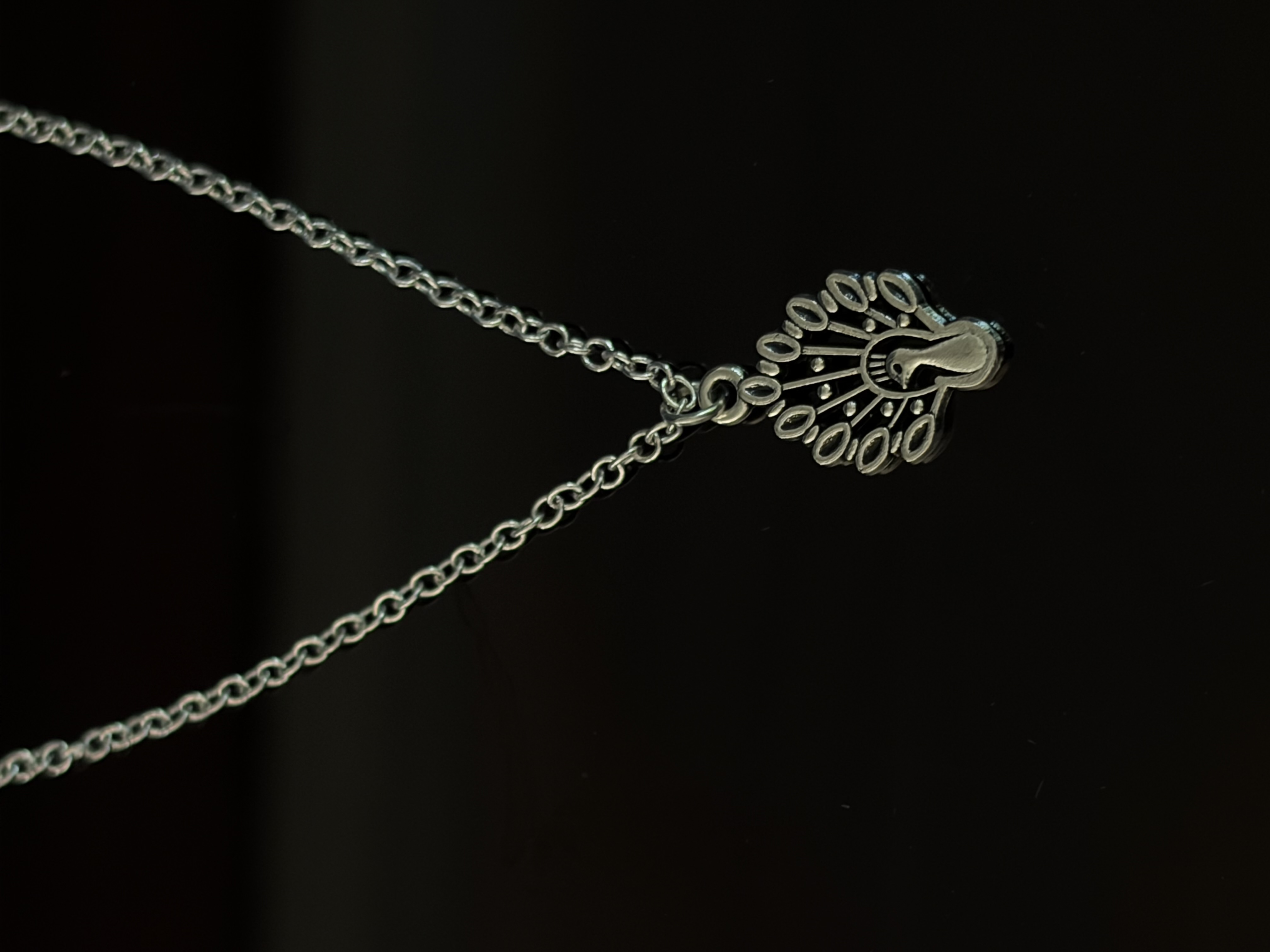 Silver Peacock